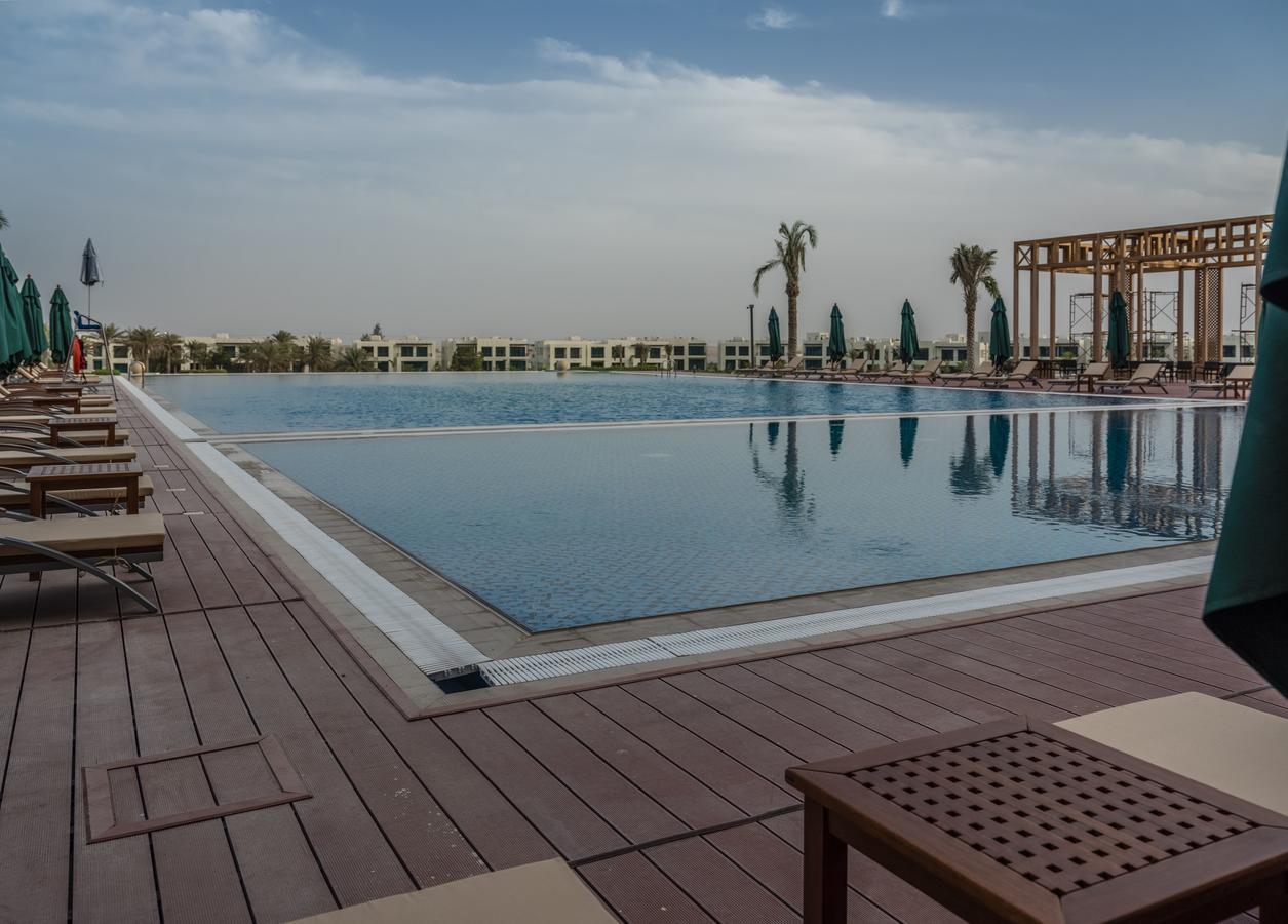 Retaj Salwa Resort&Spa Ad-Dauha Zewnętrze zdjęcie The swimming pool at the Ritz-Carlton, Dubai
